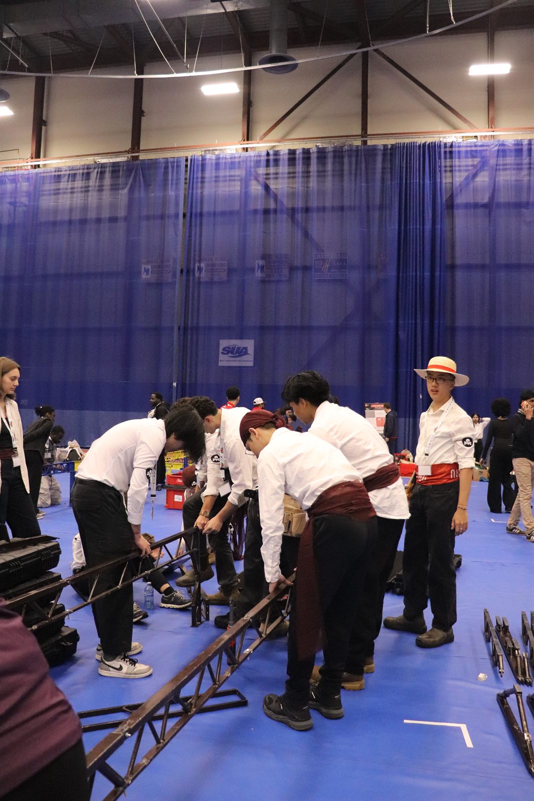 The team working on the competition floor
